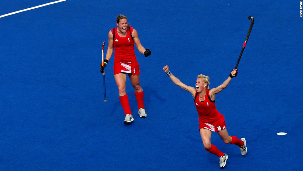 Alex Danson, right, and Crista Cullen of Great Britain react during their women's hockey bronze medal match against New Zealand.