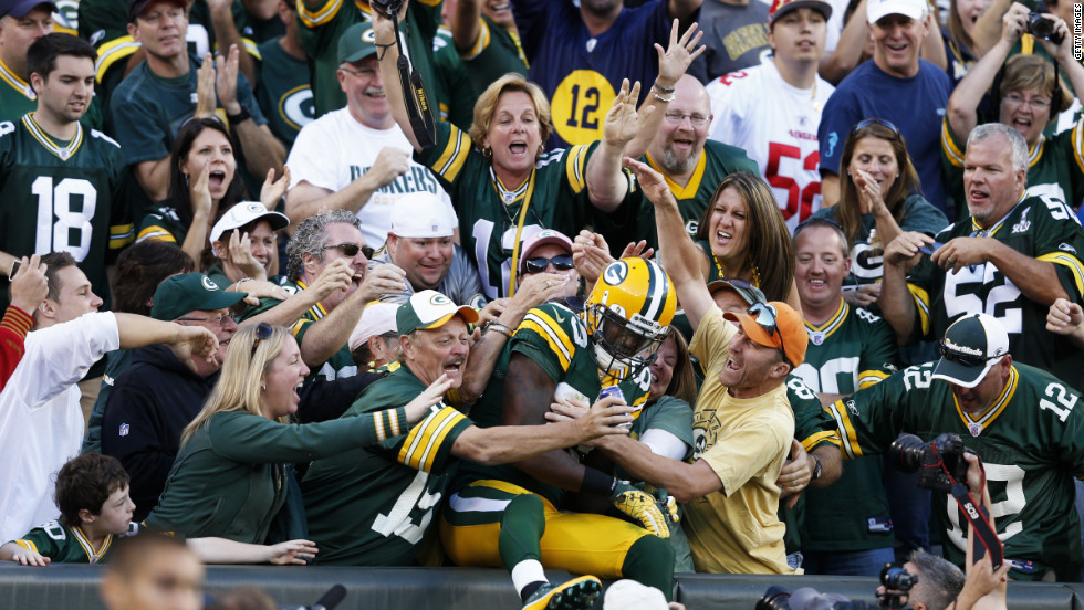 No. 89 James Jones of the Green Bay Packers celebrates with fans after catching a 10-yard touchdown pass in the fourth quarter of the game against the San Francisco 49ers on Sunday.