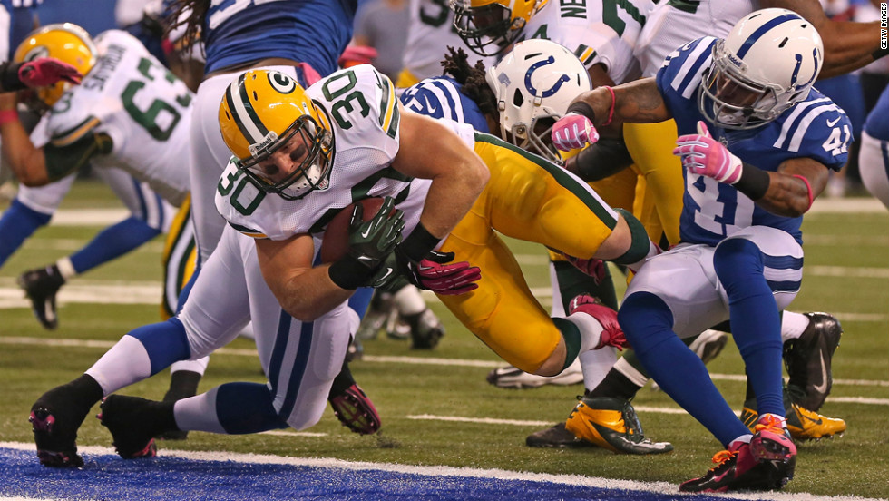 John Kuhn of the Green Bay Packers scores a touchdown Sunday against the Indianapolis Colts.