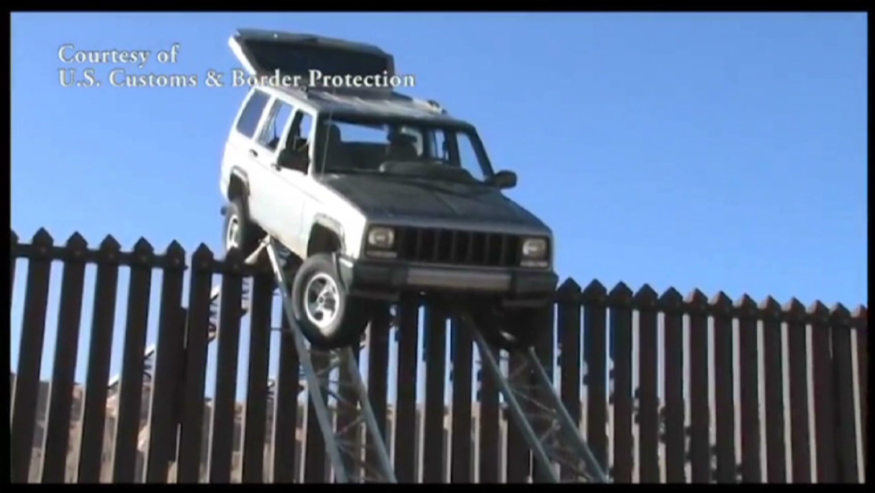 121101020421-smugglers-jeep-stuck-on-border-fence-00000413-horizontal-large-gallery.jpg
