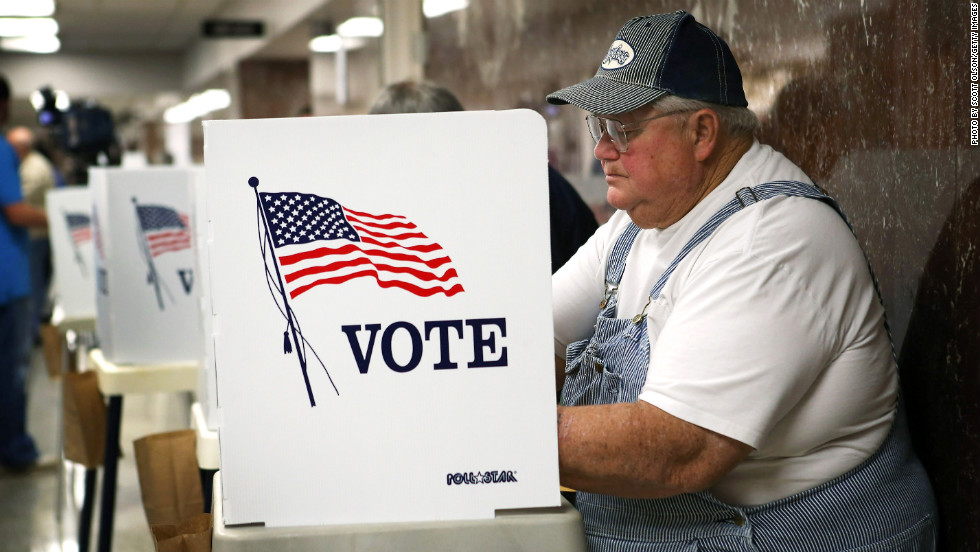Jerry Nagel fills in his ballot during early voting at the Black Hawk County Courthouse in Waterloo, Iowa, on September 27, the first day of early voting in the state.