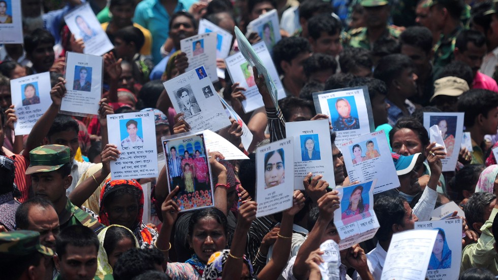Family members of missing workers march on May 14. The Bangladeshi army has wrapped up its search for bodies.