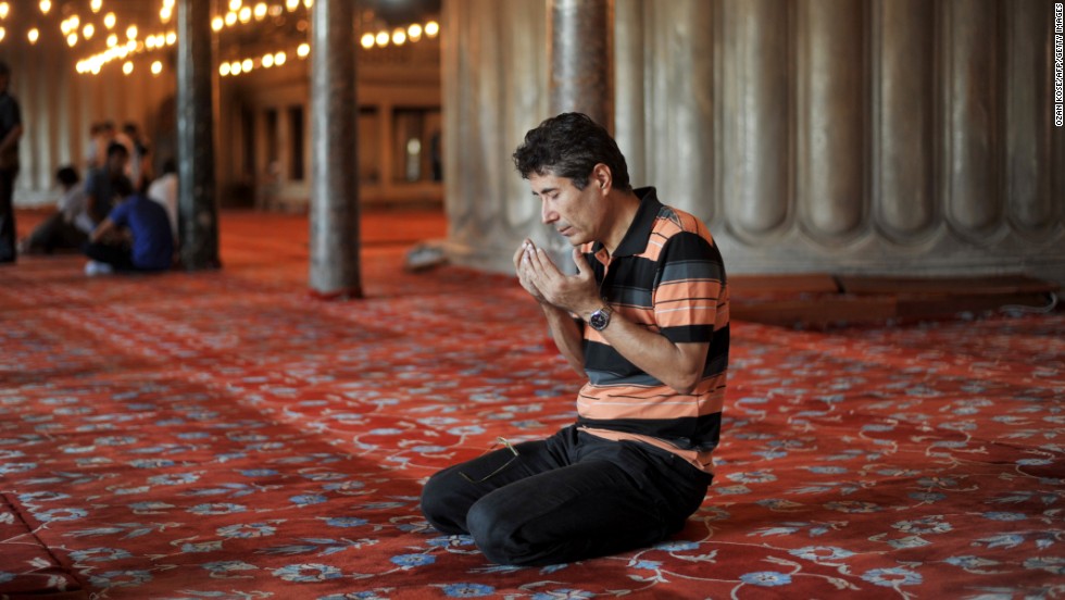 A man prays after breaking his fast on July 22 inside the Blue Mosque in Istanbul, Turkey.
