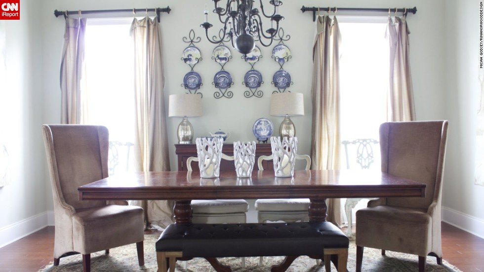 <a href="http://ireport.cnn.com/docs/DOC-1007371">Norwood's</a> kitchen opens up to a large eating area, which she kept semiformal and comfortable with an eclectic collection of chairs.