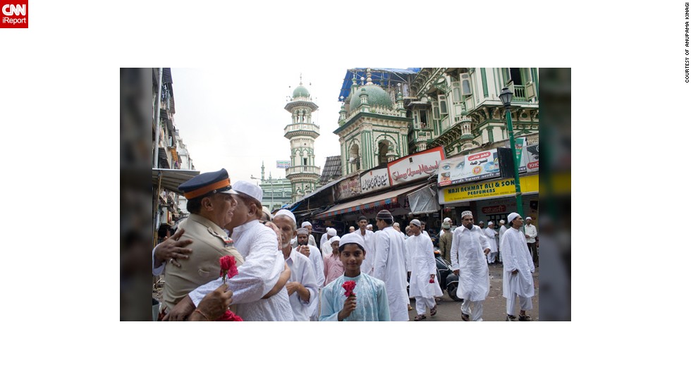 This <a href="http://ireport.cnn.com/docs/DOC-1012383" target="_blank">moment of brotherly love</a> was taken by Anupama Kinagi in Mumbai, India: "Muslims had just offered prayers and were wishing each other a very happy Eid. It is absolutely fine to hug and wish strangers on this auspicious occasion. The police officer specially arranges for rose flowers and greets Muslims outside Masjid on this special day. The Muslims accept their wishes and thank them for their extraordinary service," said the 37-year-old graphic designer.