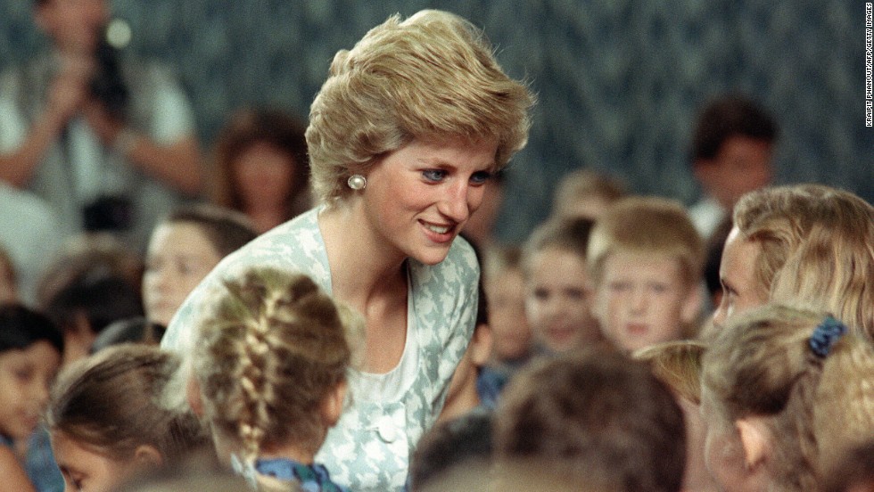 Diana, Princess of Wales listens to children during a visit to the British international school in Jakarta, Indonesia, on November 6, 1989.