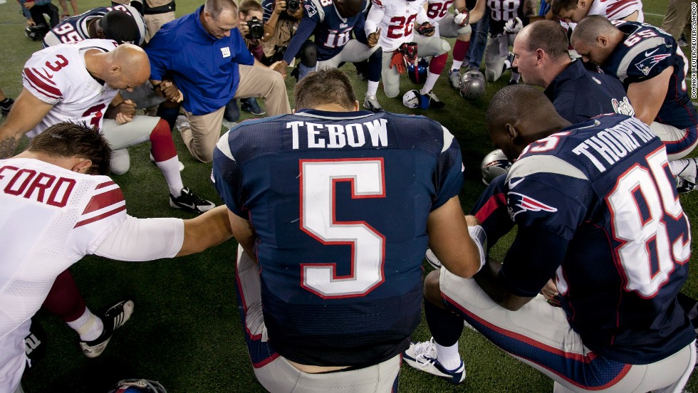 Image result for Tim Tebow praying
