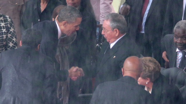 131210190357 tsr dnt todd obama castro handshake 00003329 story top