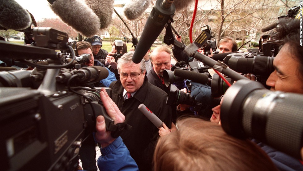 Robert Bennett, Clinton's personal attorney, makes his way through a crowd of photographers as he arrives at federal court in Washington on March 5, 1998. Starr's grand jury was questioning witnesses in the Clinton/Lewinsky scandal.