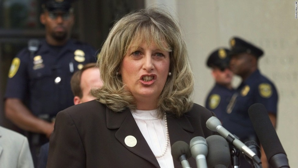 Linda Tripp, the Pentagon employee whose secret tape recordings of Lewinsky triggered the criminal investigation, speaks to reporters in Washington following her grand jury appearance on July 29, 1998.
