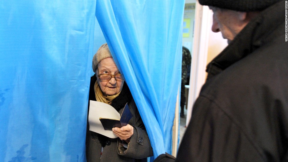 A woman leaves a voting booth in Sevastopol on March 16. <a href="http://www.cnn.com/2014/02/24/world/gallery/ukraine-in-transition/index.html" target="_blank">See the crisis in Ukraine before Crimea voted</a>