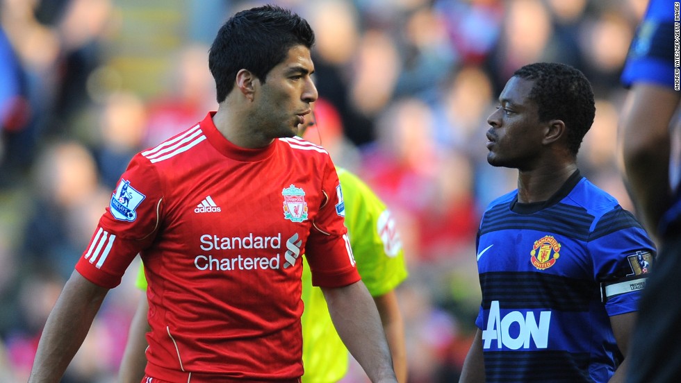 After his move to Liverpool in 2011, Suarez, left, was found guilty of racially abusing Manchester United's Patrice Evra and was fined $63,000 and banned for eight matches.