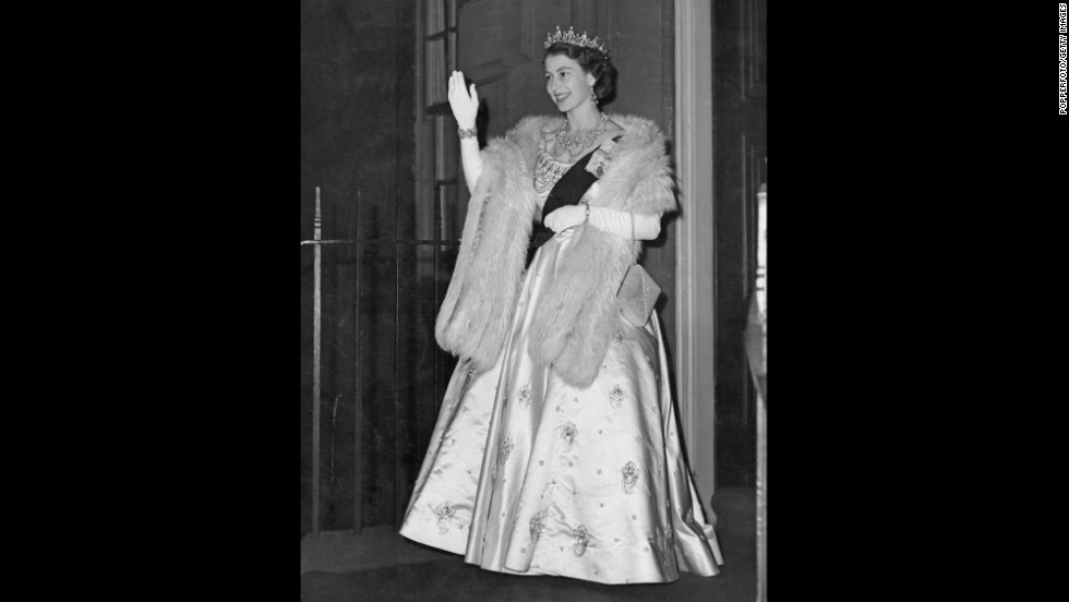 Elizabeth ascended to the throne in February 1952, when her father died of lung cancer. Here, the new Queen leaves the Royal Archers Hall in Edinburgh after a ball in June 1952. It was the first function she attended as Queen following her father&#39;s death.