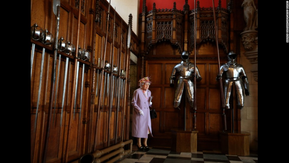 The Queen enters the Great Hall at Edinburgh Castle after attending a commemorative service for the Scottish National War Memorial in July 2014.