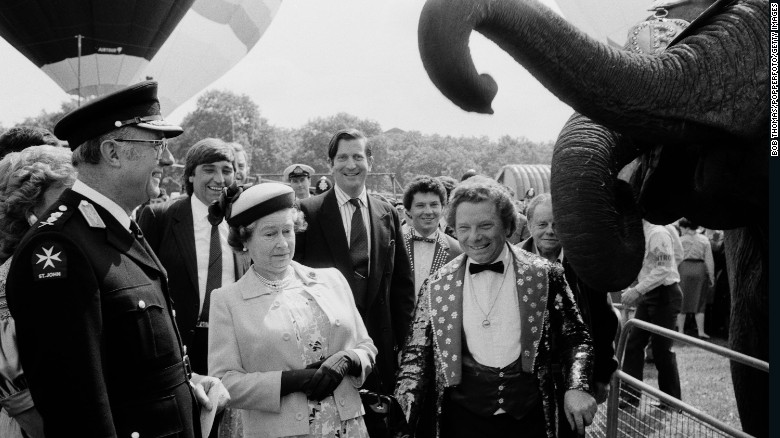 The Queen reacts to an elephant as she tours a charity event in London&#39;s Hyde Park in  June 1987.