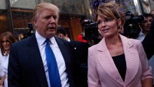 Former U.S. vice presidential candidate and Alaska Gov. Sarah Palin and Trump walk toward a limousine after leaving Trump Tower, at 56th Street and Fifth Avenue, on May 31, 2011, in New York City.