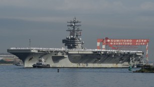 The Nimitz-class aircraft carrier USS Ronald Reagan (CVN 76) arrives at the U.S. Navy base in Yokosuka, a suburb of Tokyo, Japan, on October 1, 2015. The Reagan is the fifth U.S. carrier forward deployed to Japan following USS George Washington (CVN 73), USS Kitty Hawk (CV 63), USS Independence (CV 62) and USS Midway (CV 41), according to the Navy. Click through the gallery to see more US aircraft carriers.