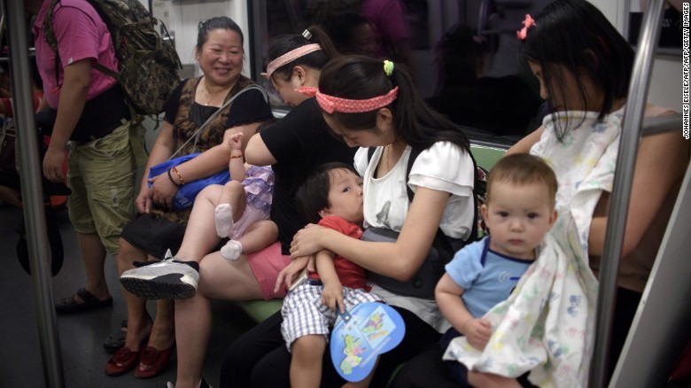 Mothers breastfeed their babies in a subway during an event of the world breastfeeding week on August 1, 2015. Around 20 mothers breastfed their babies in a subway to promote the support of women to combine breastfeeding and work. AFP PHOTO / JOHANNES EISELE (Photo credit should read JOHANNES EISELE/AFP/Getty Images)