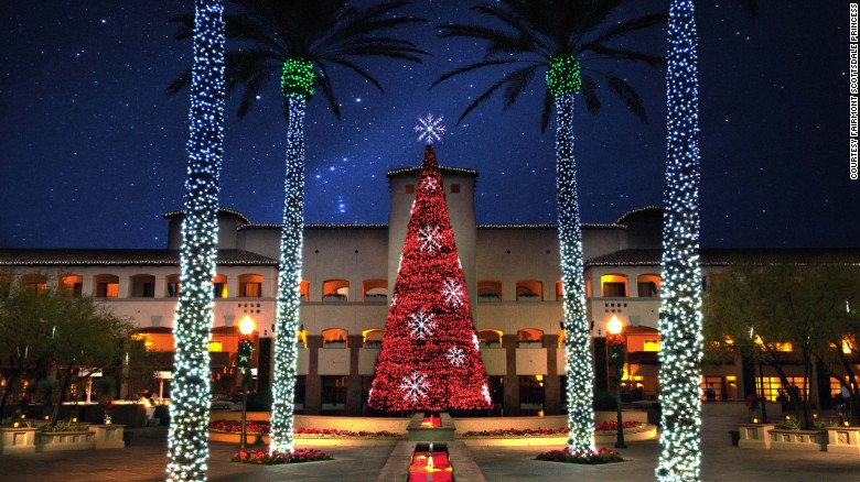 Palm trees get dressed up for Christmas at the Fairmont Scottsdale Princess in Scottsdale, Arizona.