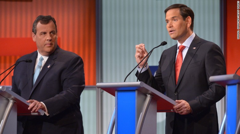 New Jersey Governor Chris Christie listens to Florida Senator Marco Rubio during the Republican presidential primary debate on August 6, 2015 in Cleveland, Ohio. 