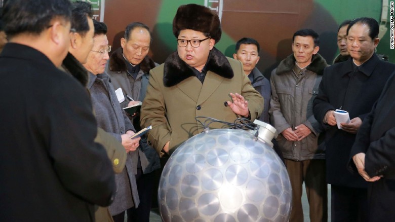 This undated picture released from North Korea&#39;s official Korean Central News Agency (KCNA) on March 9, 2016, shows North Korean leader Kim Jong Un in front of a device analysts have dubbed the &quot;disco ball.&quot; 