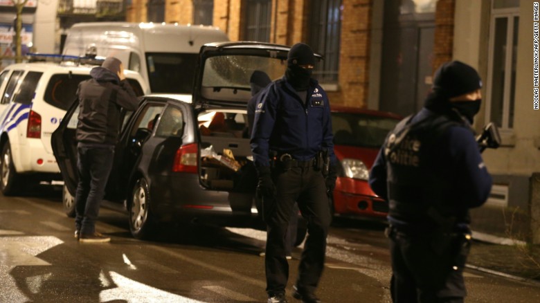 Police take part in an operation in Brussels in March, two days after the airport and metro attacks.