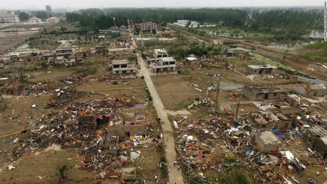 China Tornado, storms kill scores