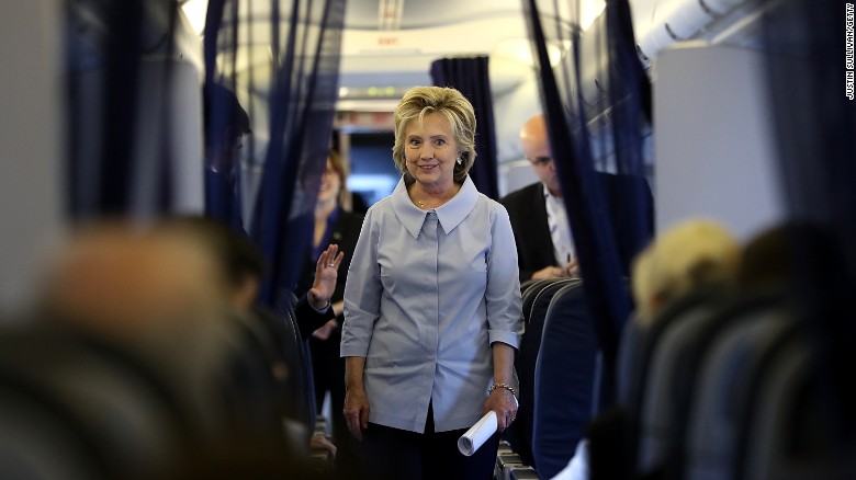 Clinton Press Do Awkward Dance At 30 000 Feet