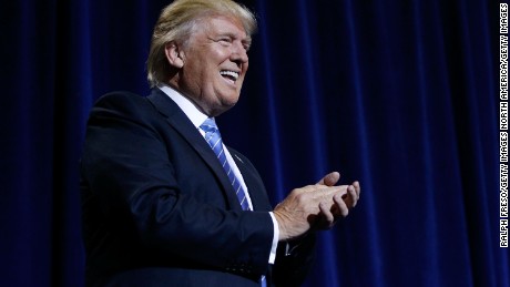 PHOENIX, AZ - AUGUST 31:  Republican presidential candidate Donald Trump applauds the crowd as he speaks to supporters about his Immigration Policy during a campaign rally on August 31, 2016 in Phoenix, Arizona.  (Photo by Ralph Freso/Getty Images)