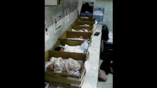 In Venezuelan hospital, newborns in cardboard boxes