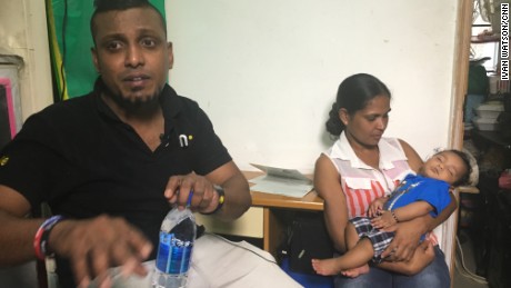 Supun Kellapatha: Supun Kellapatha, an asylum-seeker from Sri Lanka, photographed with his wife Nadeeka Nonis and their six-month old son Dinath.