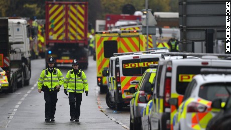 croydon tram crash london police site wednesday near cnn dozens injured dead derailment officers seen