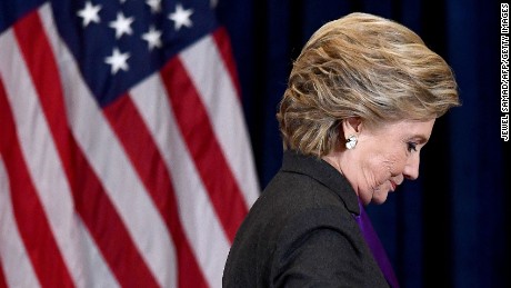 TOPSHOT - US Democratic presidential candidate Hillary Clinton steps down a staircase after making a concession speech following her defeat to Republican President-elect Donald Trump, in New York on November 9, 2016. / AFP / JEWEL SAMAD        (Photo credit should read JEWEL SAMAD/AFP/Getty Images)