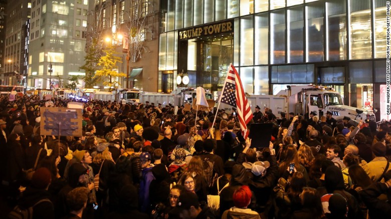 NEW YORK, NY - NOVEMBER 9: Hundreds of protestors rally against Donald Trump outside of Trump Tower, November 9, 2016 in New York City. Republican candidate Donald Trump won the 2016 presidential election in the early hours of the morning in a widely unforeseen upset. (Photo by Drew Angerer/Getty Images)