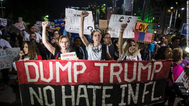 People protest President-elect Donald Trump during a march on Friday, November 11, in downtown Miami. &lt;a href=&quot;http://www.cnn.com/2016/11/10/politics/election-results-reaction-streets/index.html&quot; target=&quot;_blank&quot;&gt;At least 25 US cities&lt;/a&gt; have seen protests since Trump won the presidential election.