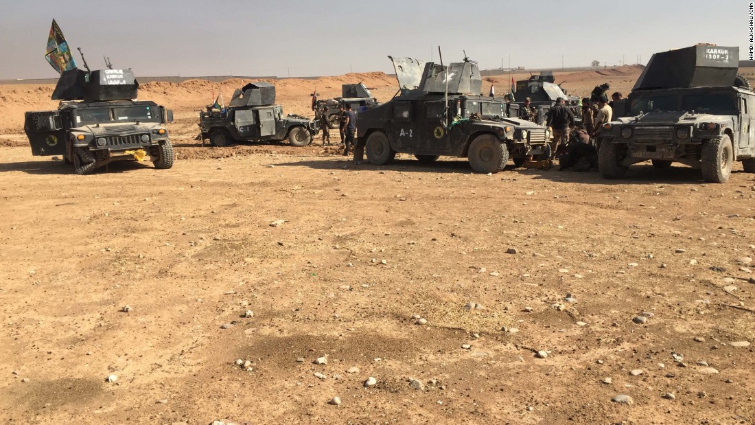 Armored Humvees from the Kirkuk regiment retreat after facing fierce resistance from ISIS.  