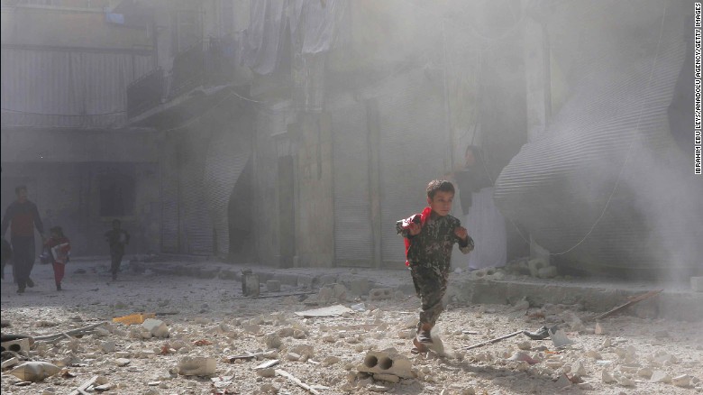 A child in the aftermath of regime airstrikes in the Salaheddin neighborhood of Aleppo.