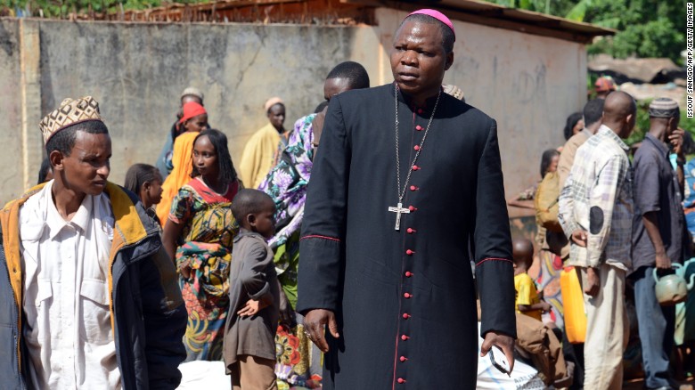 Dieudonne Nzapalainga meets Muslims who fled militia attacks at a center for displaced people in 2014.