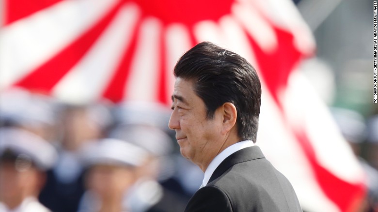 ASAKA, JAPAN - OCTOBER 23: Japanese Prime Minister Shinzo Abe inspects troops of the Self Defense Forces during the annual review at the Japan Ground Self-Defense Force Camp Asaka on October 23, 2016 in Asaka, Japan. (Photo by Tomohiro Ohsumi/Getty Images)