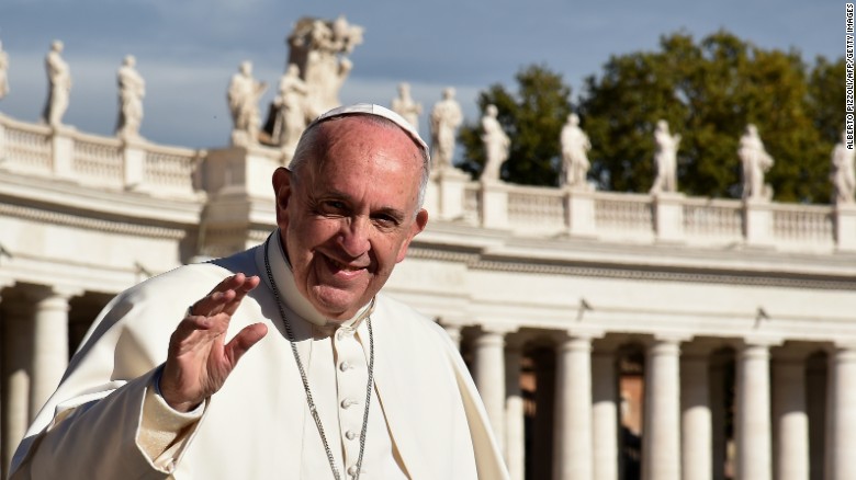 Pope Francis waves to the crowd at St. Peter&#39;s Square in November 2016.  