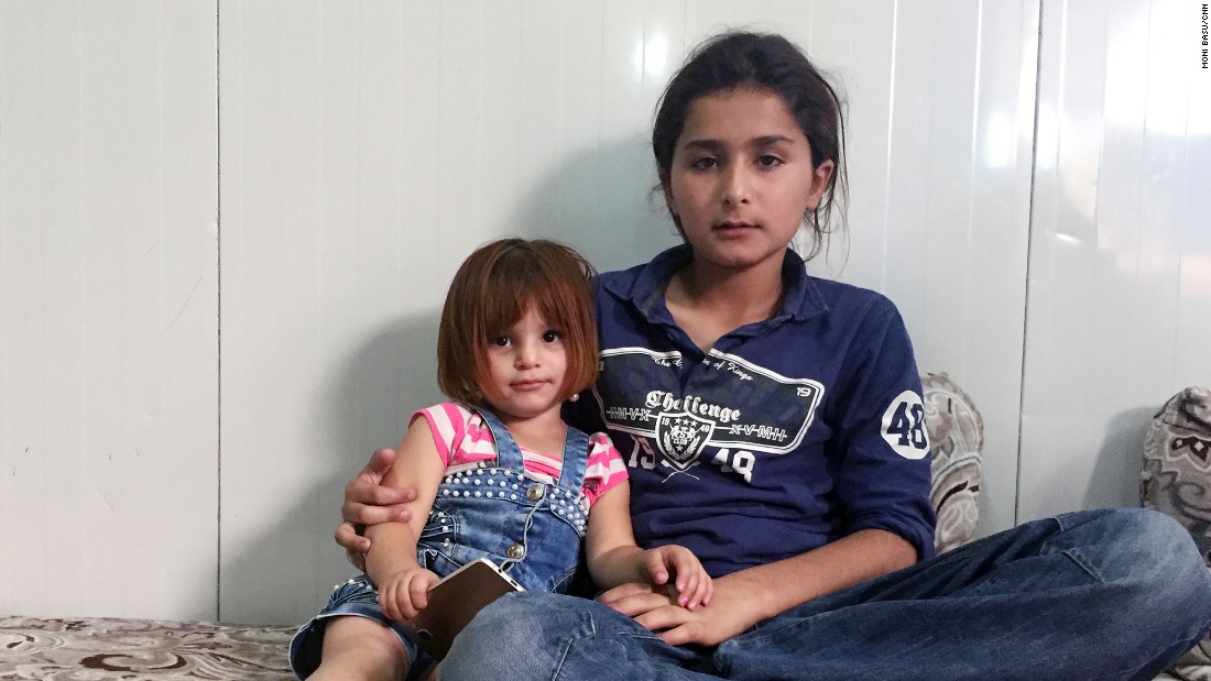 Ahmed Mushal Hassan&#39;s son Yousif, right, and daughter Asal were away from home when ISIS took over Mosul.
