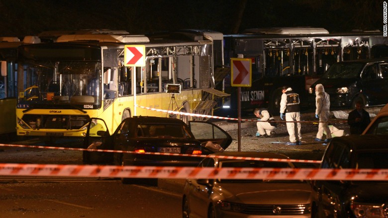 Officials investigate the scene of explosions near Istanbul&#39;s Besiktas stadium.