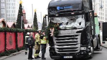 Authorities examine a truck that crashed the evening before into a Christmas market in Berlin, Germany, on Tuesday, December 20. At least 12 were killed and 50 injured in what police are investigating as a likely terrorist attack. German officials told CNN that the man suspected of deliberately ramming the truck into the market is a refugee from the Afghanistan-Pakistan region.