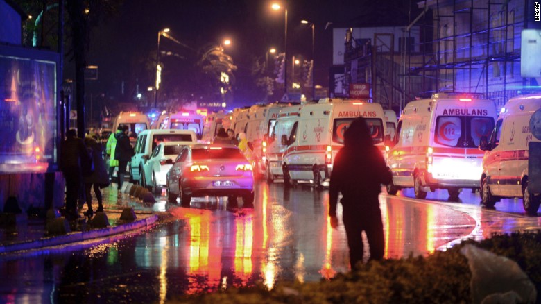 Medics and security officials work at the scene after an attack at a popular nightclub in Istanbul, early Sunday, Jan. 1, 2017. Turkey&#39;s state-run news agency says an armed assailant has opened fire at a nightclub in Istanbul during New Year&#39;s celebrations, wounding several people.(IHA via AP)