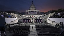 The sun begins to rise behind the Capitol as Washington prepares for Donald Trump's inauguration.
