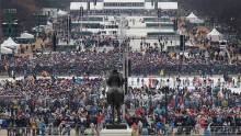 Crowds file in along the National Mall before Trump's swearing-in.