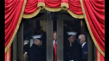 Trump waits to step out onto the portico for his presidential inauguration.
