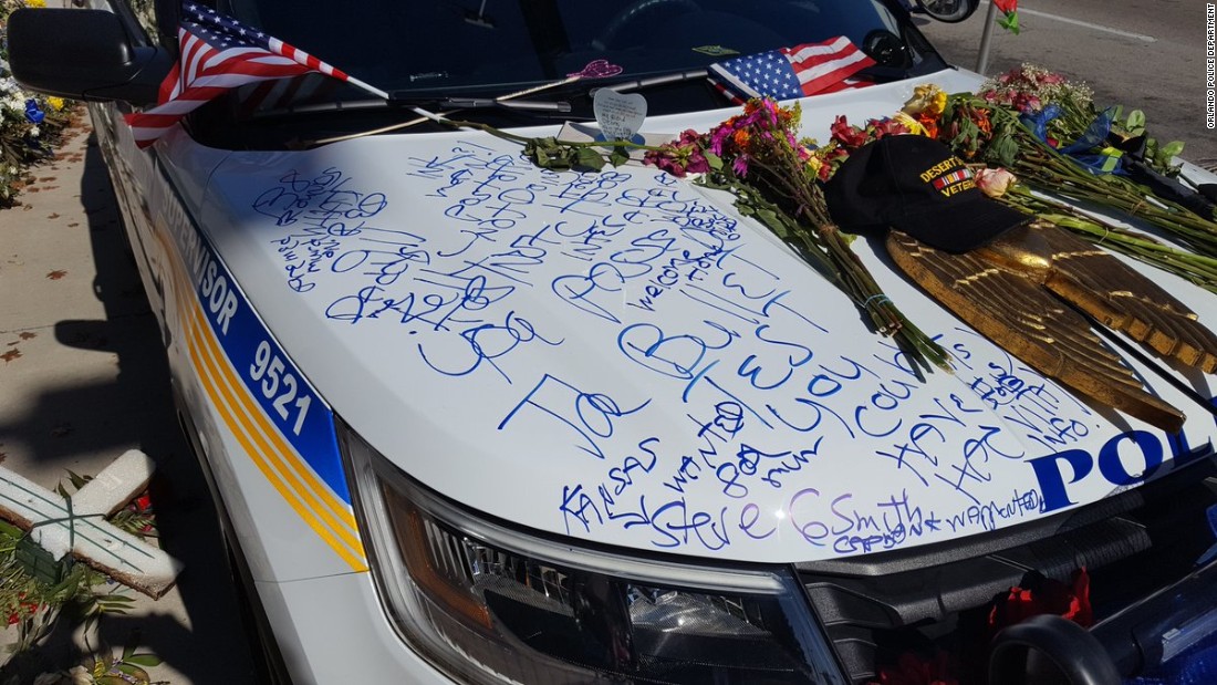 Slain Orlando police officer's car vandalized - CNN International