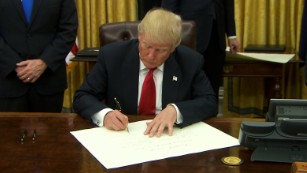 Trump signs executive order on Obamacare