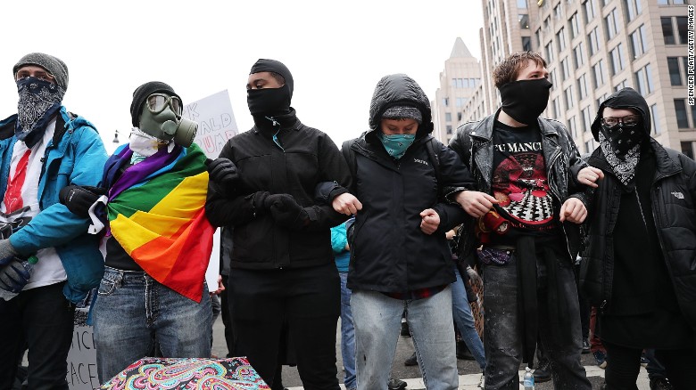 Demonstrators protest during the inauguration ceremonies for Donald Trump on Friday, January 20, in Washington. While protests were mostly peaceful, &lt;a href=&quot;http://www.cnn.com/2017/01/19/politics/trump-inauguration-protests-womens-march/&quot;&gt;some erupted into violence&lt;/a&gt;. 